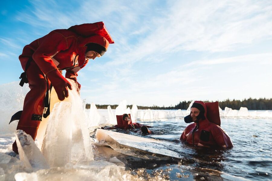 Daytime Ice Floating Rovaniemi, Frozen Lake Experience - Getting Ready: Rescue Suits, Socks, and Cold-Weather Reality