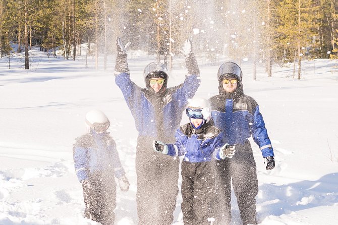 Family Snowmobile Safari from Santa Claus Village - Warming Up at the Campfire: Sausages, Marshmallows, and Berry Juice