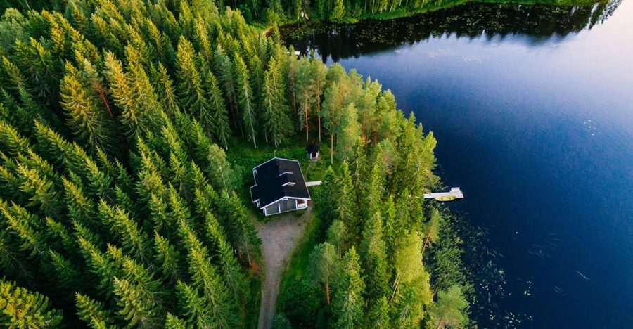 From Rovaniemi: Midnight Sun Forest Lake Float - Midnight sun rays on water: what you’re actually photographing