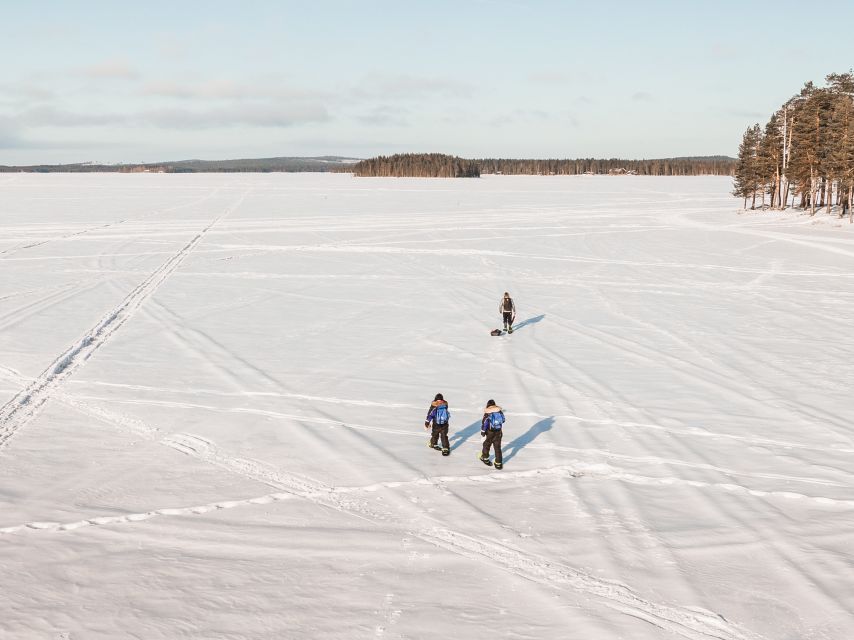From Rovaniemi: Snowshoeing and Ice Fishing Tour - The Frozen Lake Moment: Drilling Your Fishing Spot