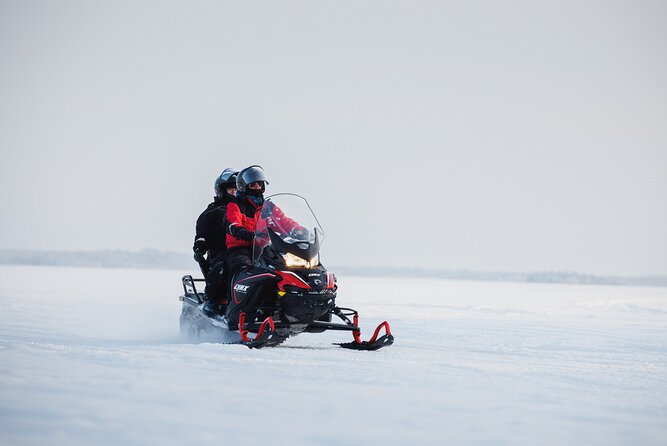 Ice Fishing and Snowmobile Safari Combo in Lapland - The snowmobile ride: shared thrill, real Arctic scale