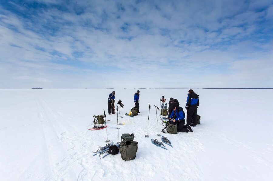 Lapland: Ice Fishing, Floating & BBQ Snow Adventure - Ice fishing on a frozen lake: technique lessons and why the catch can be secondary