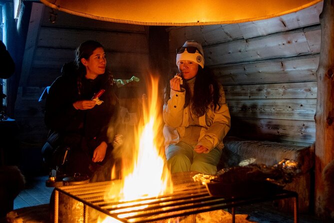 Northern Lights Hunt from Rovaniemi with Folk Tales and Snacks over Campfire - Hot berry juice and snacks cooked on the fire