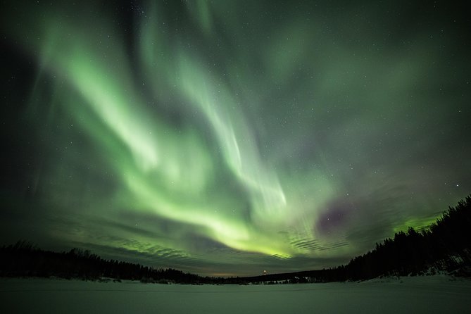 Northern Lights Hunt from Rovaniemi with Folk Tales and Snacks over Campfire - The lakefront Finnish tent and campfire setup
