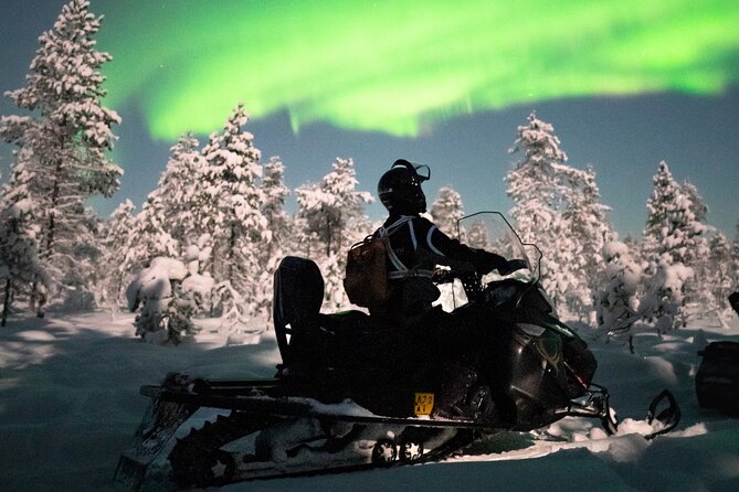 Northern lights safari by snowmobile - The Aurora Hunt: Open Fire Warmth and the Reality of Not-Guaranteed Skies