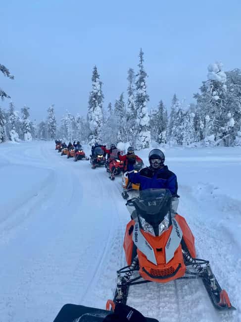 Pyhä: Forest Trails Snowmobile Safari - Gear up properly: overalls, helmet, and boots