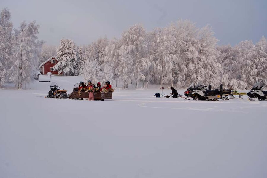 Rovaniemi: Ice Fishing and Snowmobile Tour with Snacks - Rovaniemi pickup and what the 10 km limit means for your timing