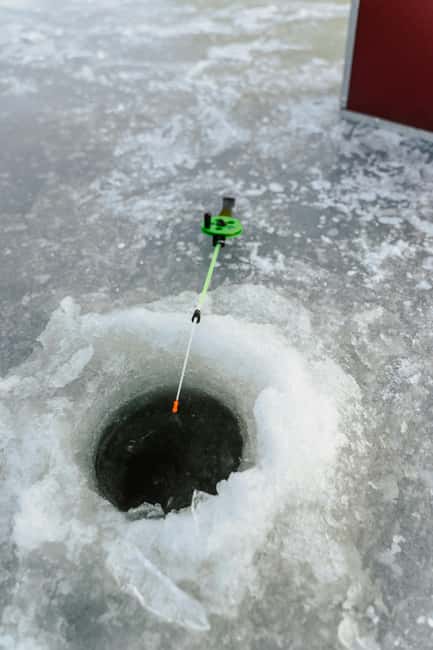 Rovaniemi: Ice Fishing Trip with Snacks and Drinks - The van ride north and the short forest walk to the lake