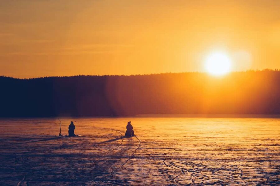 Rovaniemi: Ice Fishing Trip with Snacks and Drinks - Learning the basics: drilling your own hole and baiting for fish