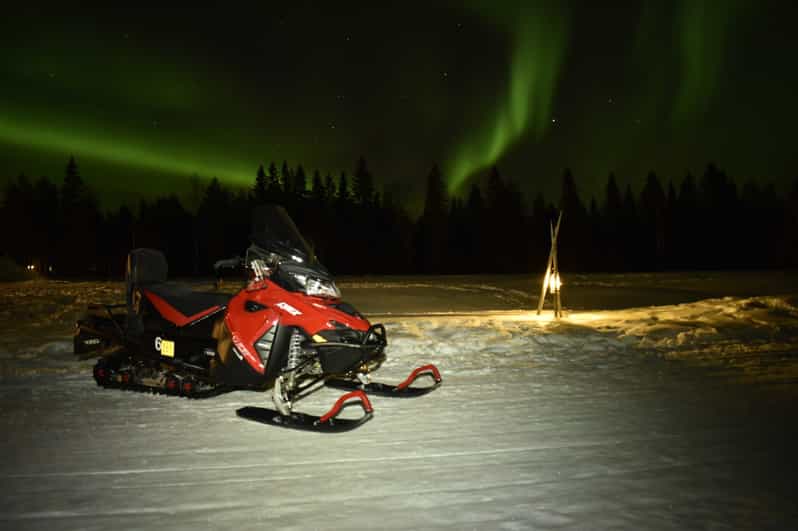 Rovaniemi: Night Snowmobile Tour - The Campfire Stop: Hot Drinks, Sausage, and Arctic Stories That Land