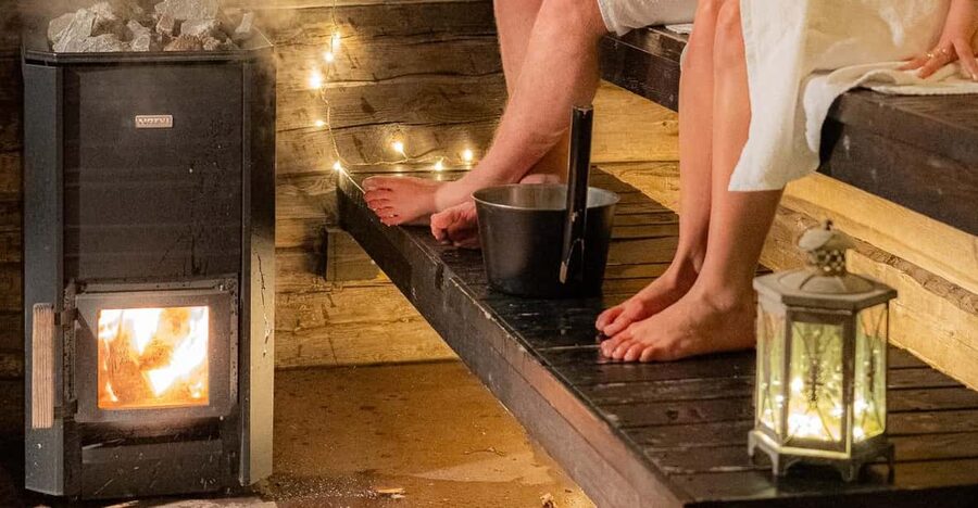 Rovaniemi: Private Sauna and Ice Swimming Tour with Snacks - Hotel pickup and a private wooden sauna waiting for you