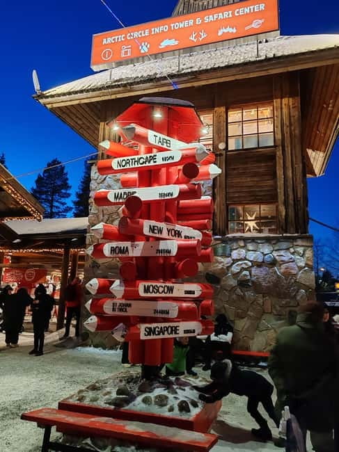 Rovaniemi:Santa Claus Village Guided Tour with Santa's gift - Pickup, van ride, and your guide’s job: keep it moving, keep it simple