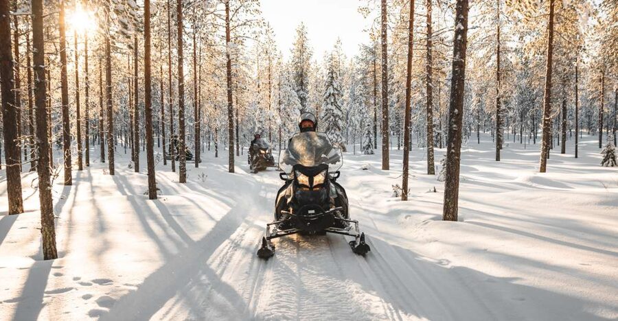Rovaniemi: Sunrise Electric Snowmobile Tour with Snacks - The sunrise-style experience: short daylight and a viewpoint stop