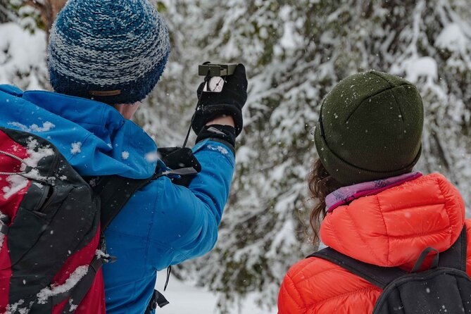 Snowshoeing Adventure with Ice-Fishing, Fire and Survival - Frozen lake ice-fishing: drill, wait, and cook if you catch